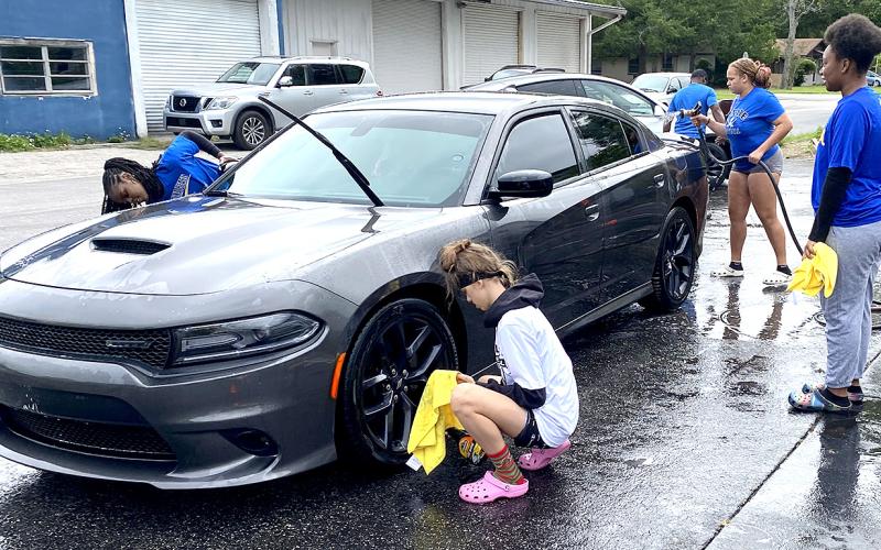Nassau Ballerz are washing cars and raising money. Photos by Beth Jones/News-Leader