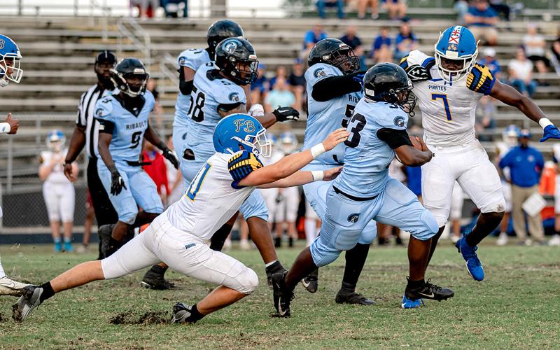 The Fernandina Beach High School football team traveled to Ribault Thursday night to play in its spring game. Photos by Penny Glackin/Special