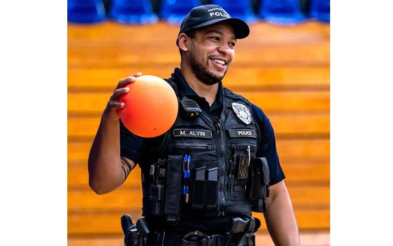 Fernandina Beach police officers stopped by the Fernandina Beach High School gym Tuesday and played dodgeball with the children attending the P.E. Camp this summer. Photos by Penny Glackin/Special 