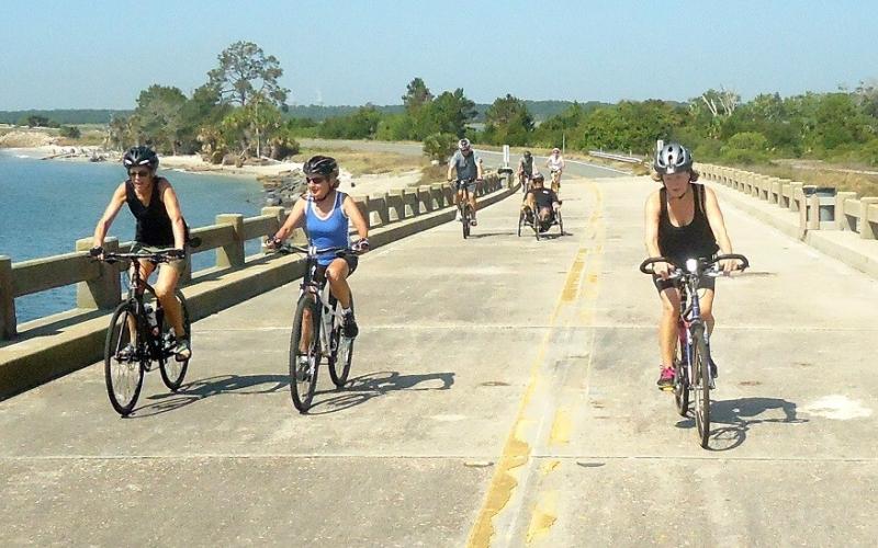  Cyclists come onto Amelia Island over the George Crady Bridge. As more people ride on the island, riders need more bike lanes and other safety precautions, a task force created to study the issue said. Submitted photo