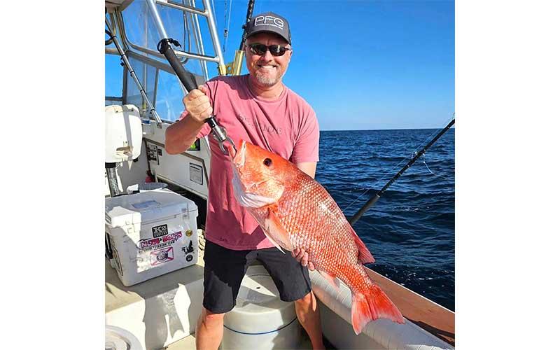 Zach Terry boated this big 18-pound red snapper while fishing with Capt. Allen Mills over the weekend. Photo by Terry Lacoss