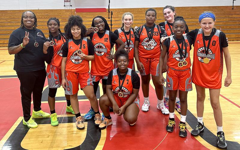 The seventh-grade championship teams included the Lady Warriors from Brunswick, Ga. Submitted photo