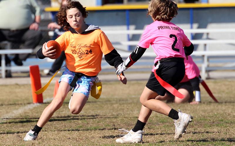 Opening day for flag football. Photo by Beth Jones/News-Leader