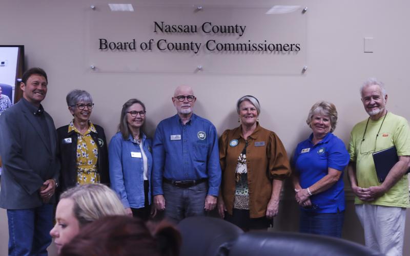 Members of The Bartram Garden Club pose with Commissioner Jeff Gray after the proclamation of William Bartram Month April 8 at the Nassau County Commissioners meeting. From left are Gray, Linda Martin, Beverly Williams, Marc Williams, Karen Reily, Pam Dawson and Jerry Walthall. Photo by Ashley Chandler