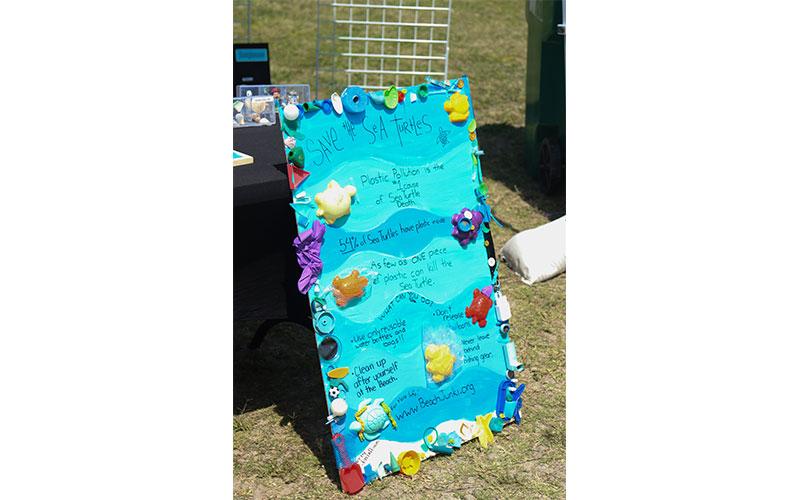 This poster was stationed at the Beach Junki canopy in the Kids Corner of Earth Day Turtle Fest. Kids corner contained a ton of information to teach kids about the dangers to sea turtles and the importance of keeping the beach clean. Photo by Ashley Chandler/News-Leader